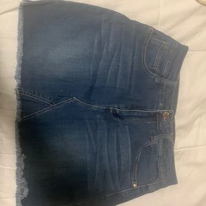 Blue skirt, pockets in the front & back.